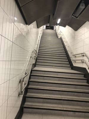 The stairs at the end of the tunnel in exiting Liverpool street station at the Moorgate end